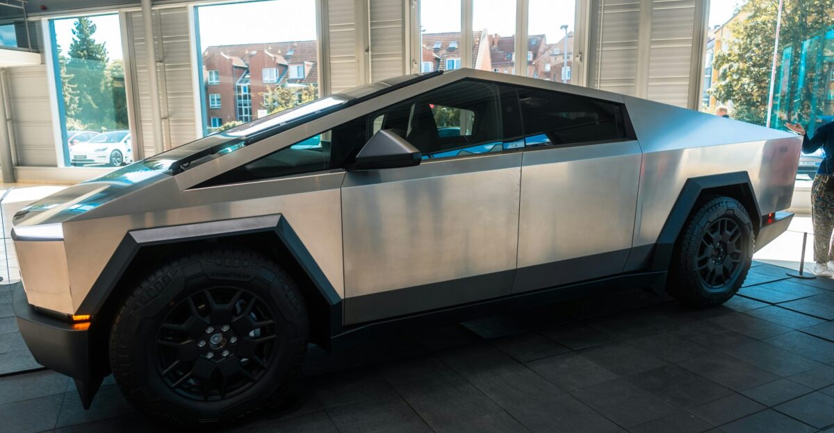 A futuristic car parked inside of a building