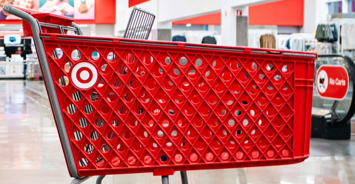 Red target shopping cart inside a store.