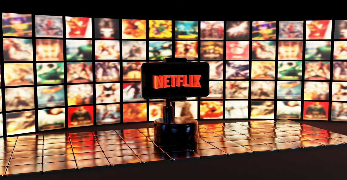 Netflix logo displayed on a wall of movie posters