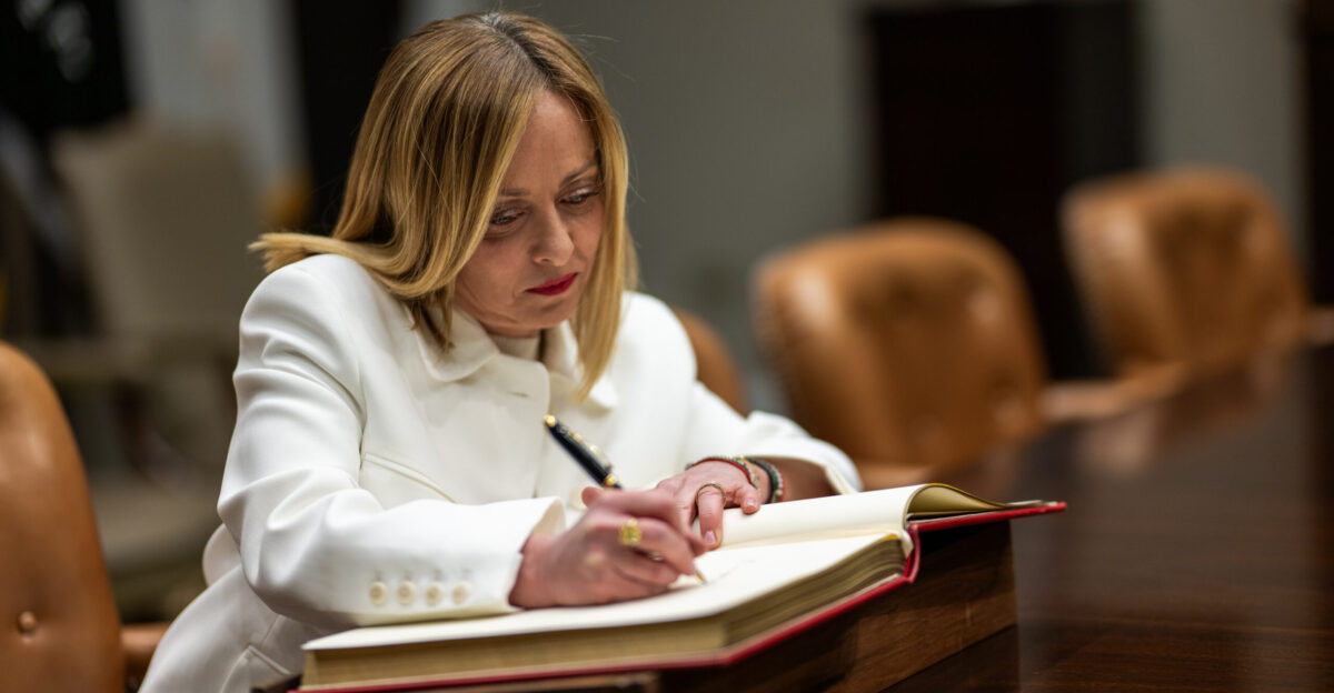Prime Minister Giorgia Meloni of Italy signs the guest book in the Roosevelt Room Thursday April 17 2025 before a bilateral meeting with President Donald Trump Official White House Photo by Daniel Torok