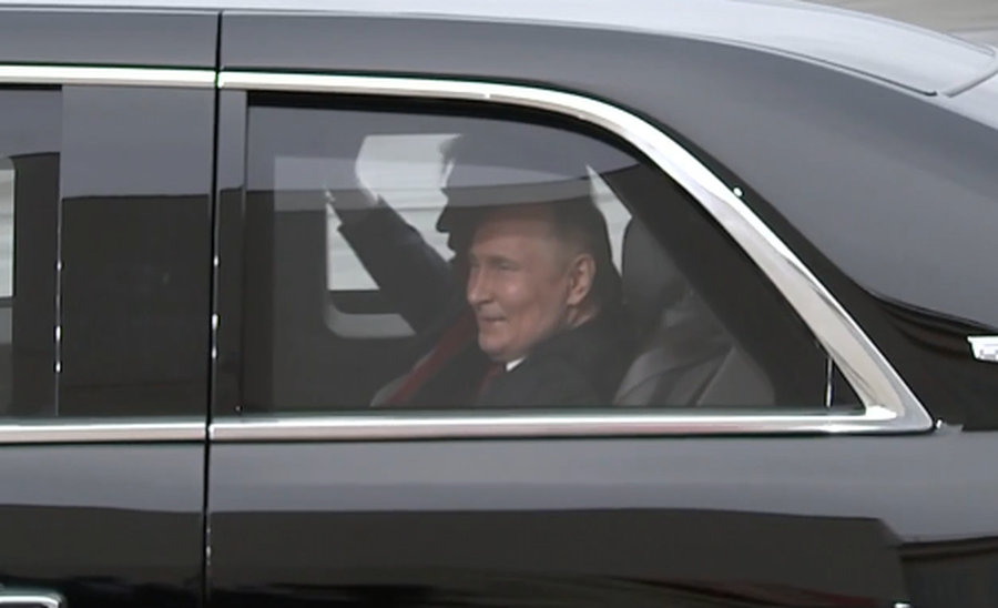 Donald Trump as President of the United States rides in his presidential limo - the Beast - with Russian President Vladimir Putin