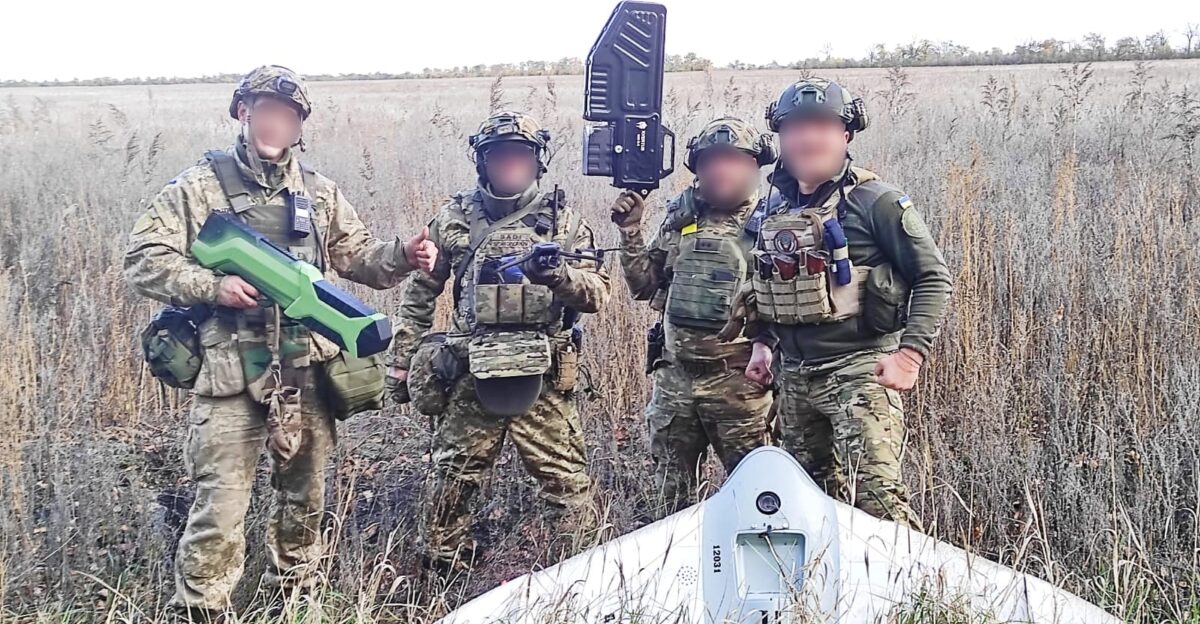 Soldiers of Dnipro Brigade of National Guard of Ukraine showing a downed Russian Grifon 12 UAV in Donetsk Oblast Kvertus drone jammer is shown