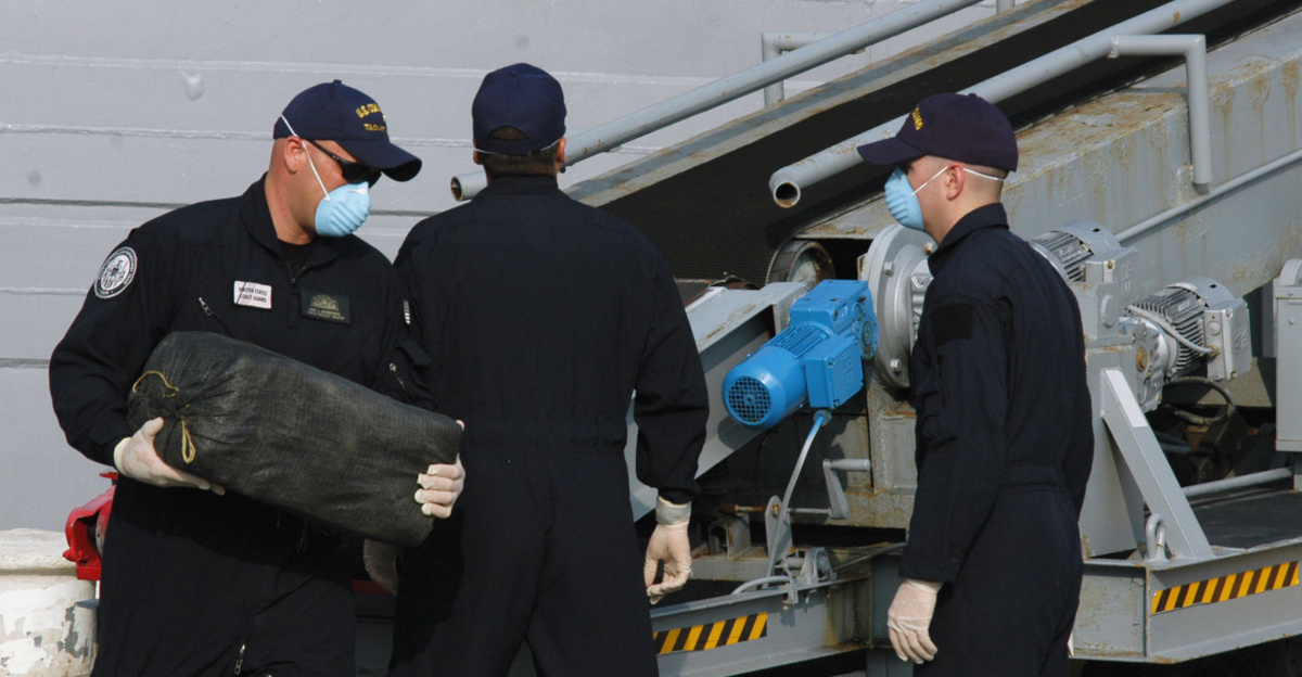 MAYPORT, Fla. (July 14, 2008) U.S. Customs agents offload bales of cocaine from the guided-missile frigate USS Boone (FFG 28). Boone interdicted more than a metric ton of narcotics while deployed on a counter illicit trafficking operation for U.S. Naval Forces Southern Command/U.S. 4th Fleet in conjunction with Joint Interagency Task Force South in the U.S. Southern Command area of responsibility. U.S. Navy photo by Mass Communication Specialist 1st Class Holly Boynton (Released)