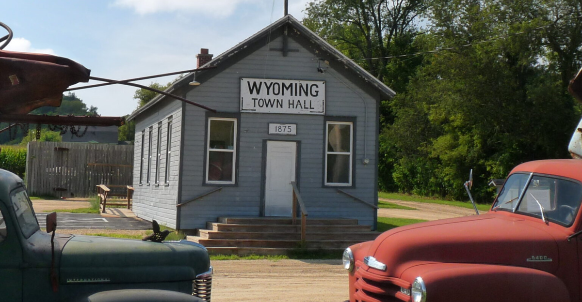 Today's town hall in the Town of Wyoming in Iowa County, Wisconsin was built as a one-room school in 1875. The assemblages in the foreground are art.
