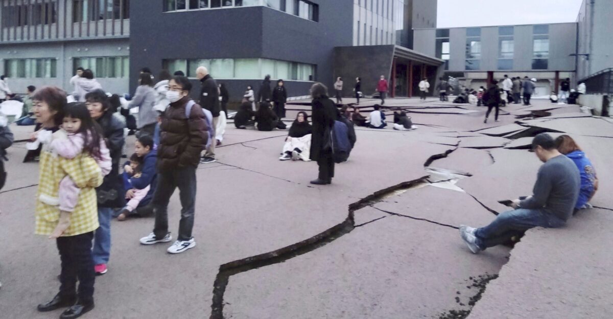 Japan lowers its tsunami warning after a series of strong