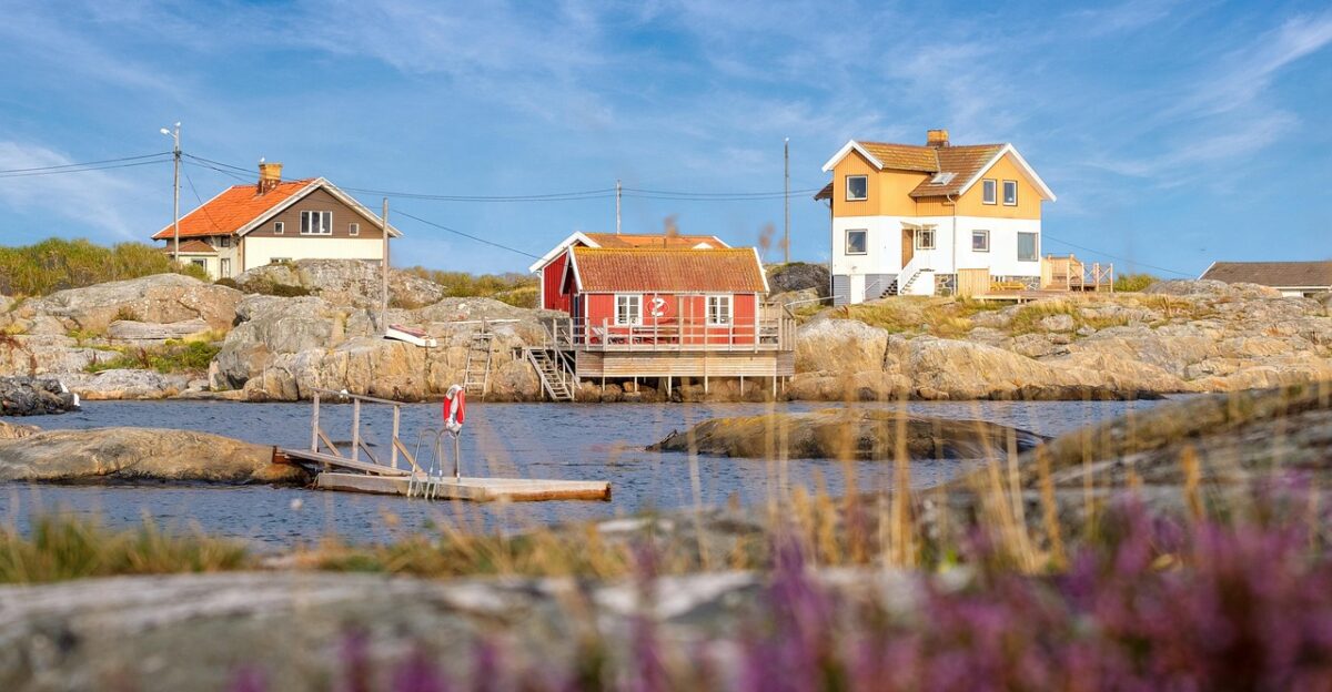 coast beach house beach house holiday home woodhouse sweden house nature water sea lake heaven clouds rock stony outlook landscape