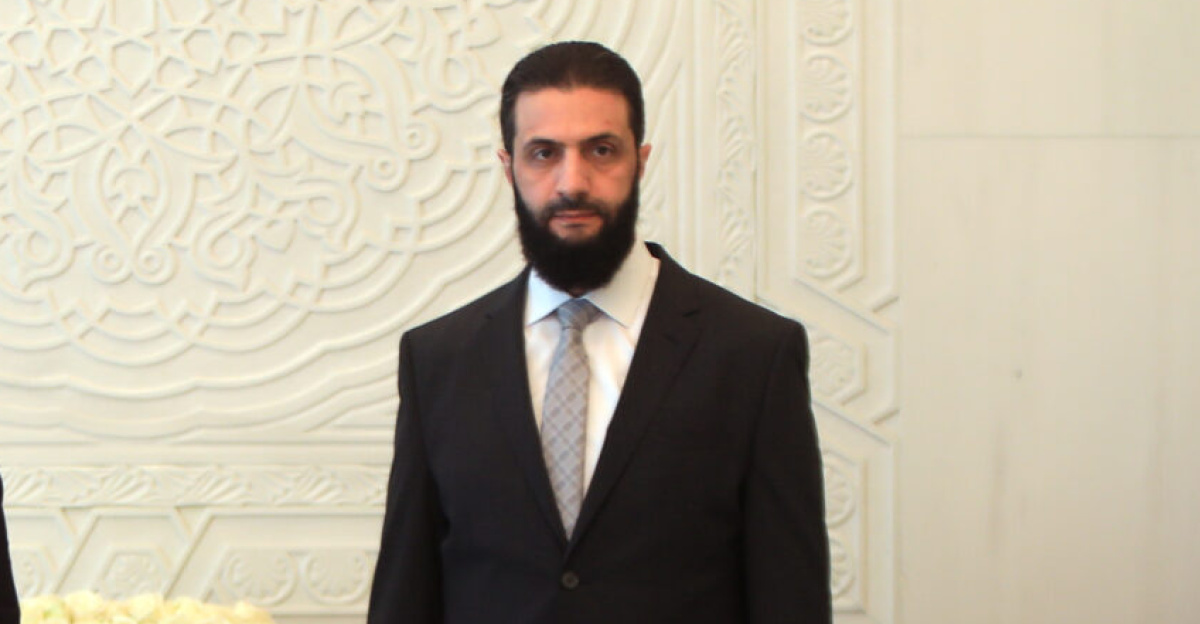 Ahmad al-Shara, President of the Syrian transitional government, center right and Hadja Lahbib, center left.