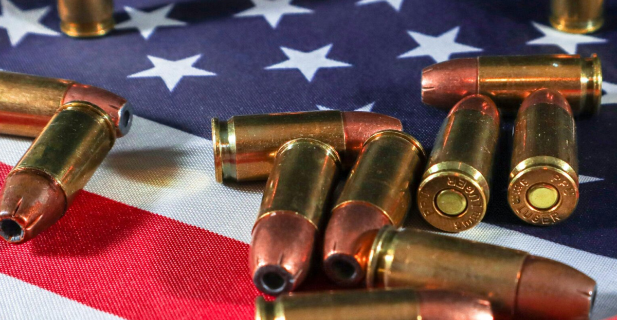 Close-up of ammunition on the American flag, signifying defense and patriotism.