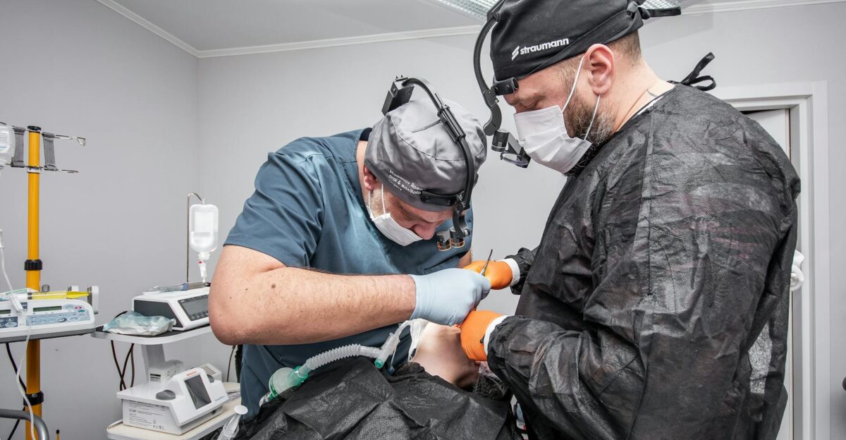 Two surgeons focus on a delicate operation in a Kyiv hospital operating room