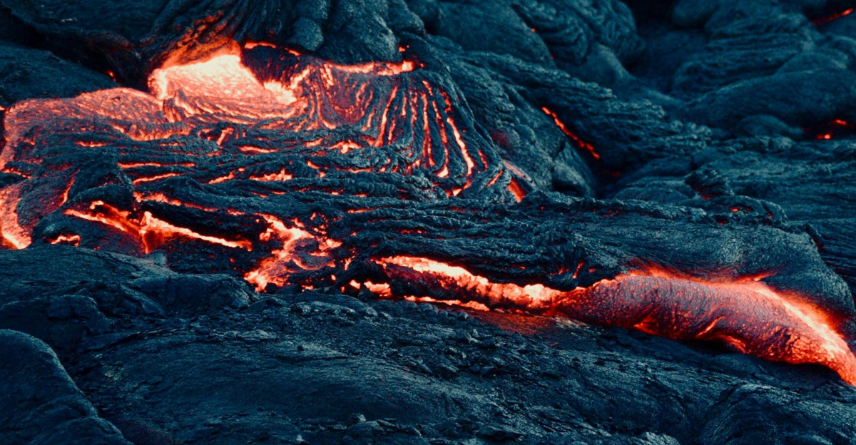 A mesmerizing view of flowing lava on a volcanic landscape, capturing the intense heat and texture.