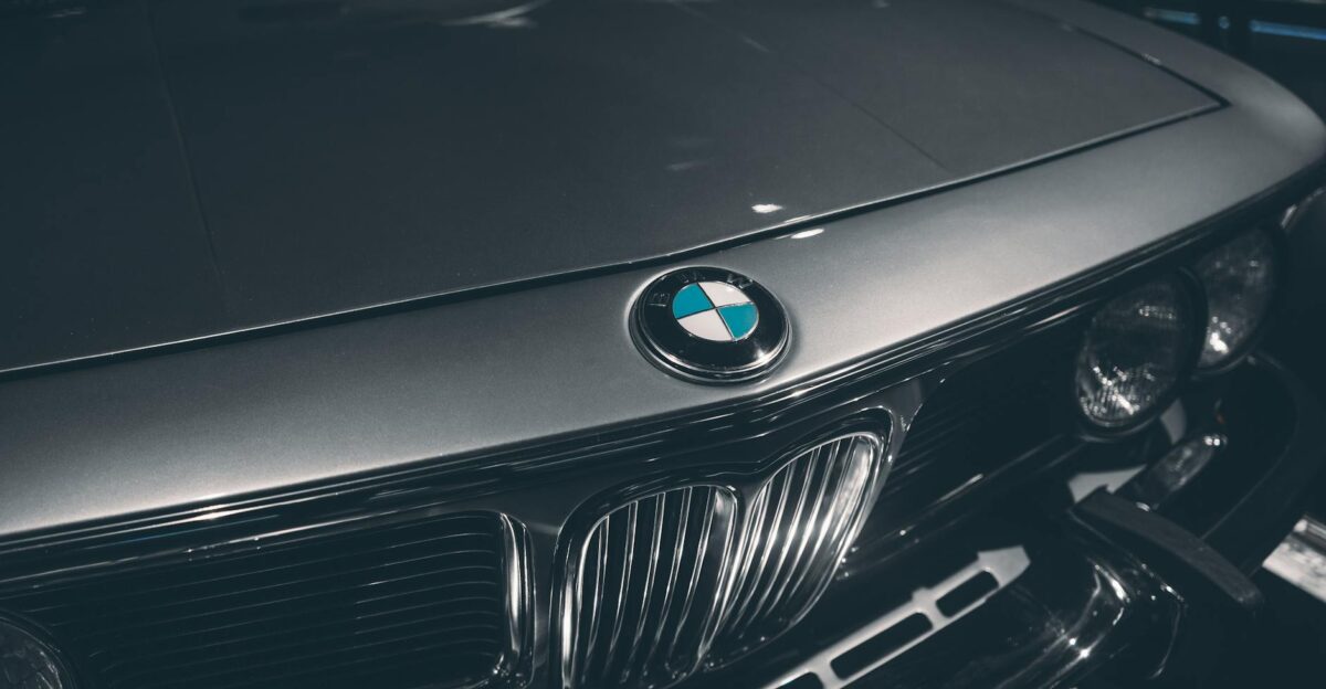 Close-up of classic BMW hood showcasing emblem and chrome details Captured in Munich Germany