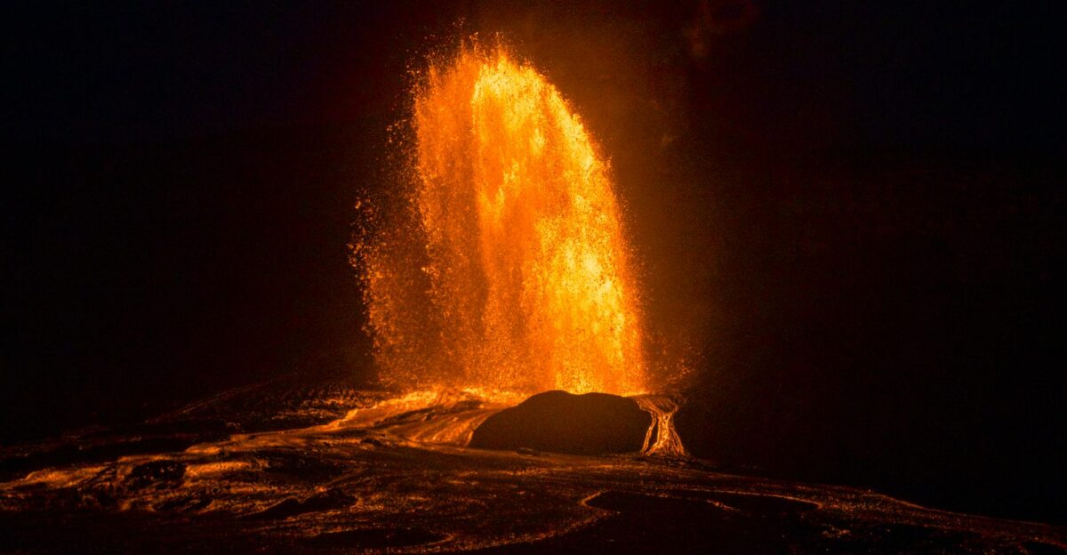 Stunning night capture of a fiery volcanic eruption in Hawaii with glowing lava