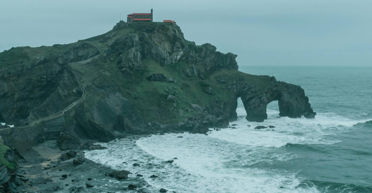 Breathtaking view of San Juan de Gaztelugatxe's rugged coastline, showcasing dramatic cliffs and a scenic chapel.