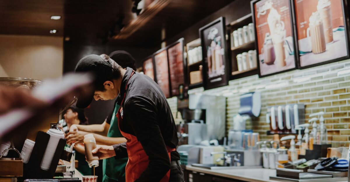 two person standing on fastfood desk