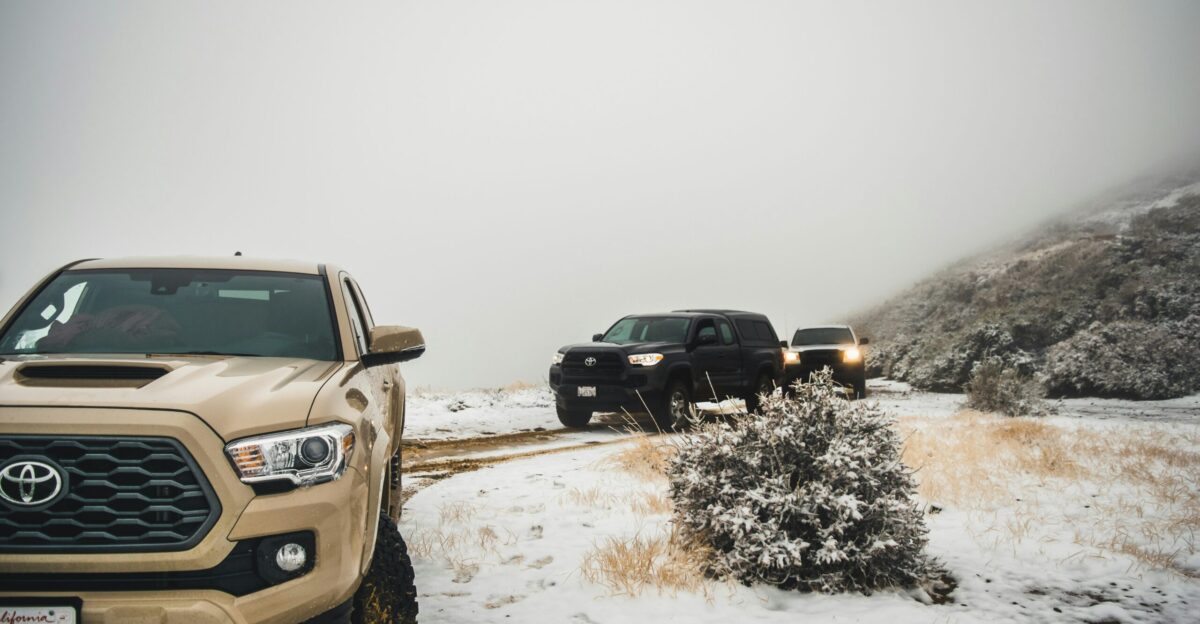 black suv on brown field during daytime