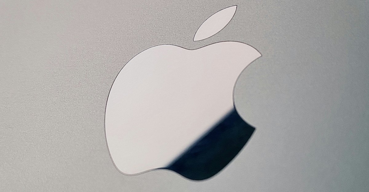 silver apple logo on silver surface