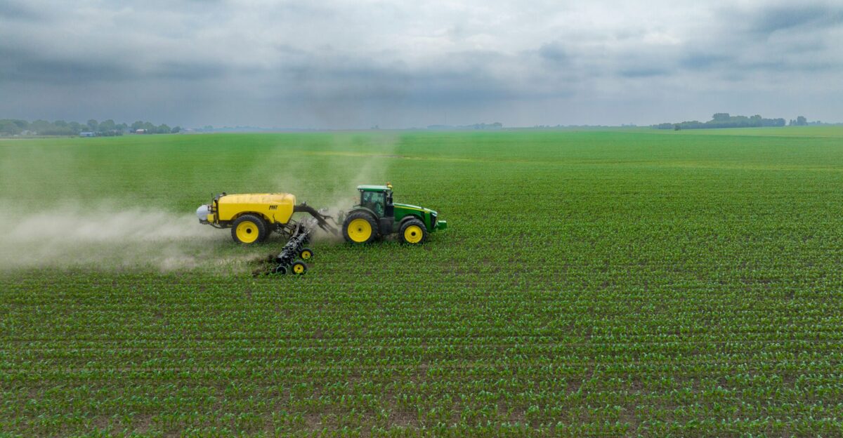a few farm machines in a field