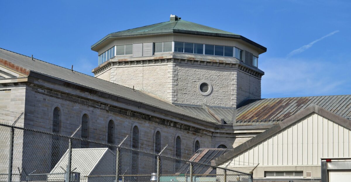 a tall building with a clock on the top of it
