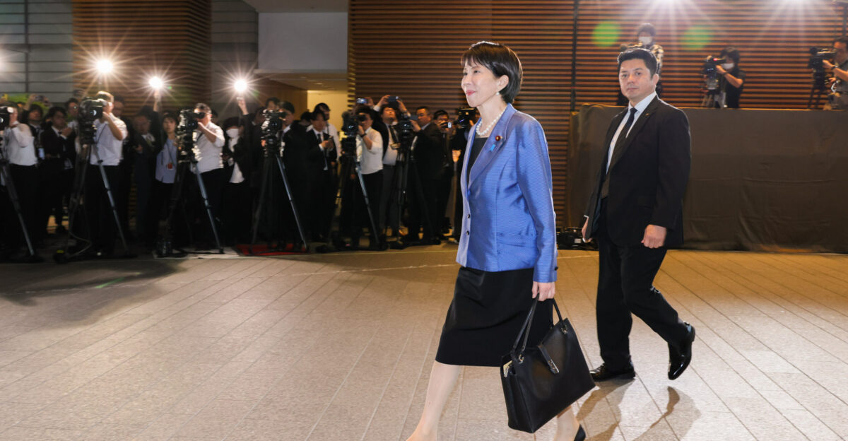 Sanae Takaichi walks into the Prime Minister s Official Residence Kantei on her first day as Prime Minister