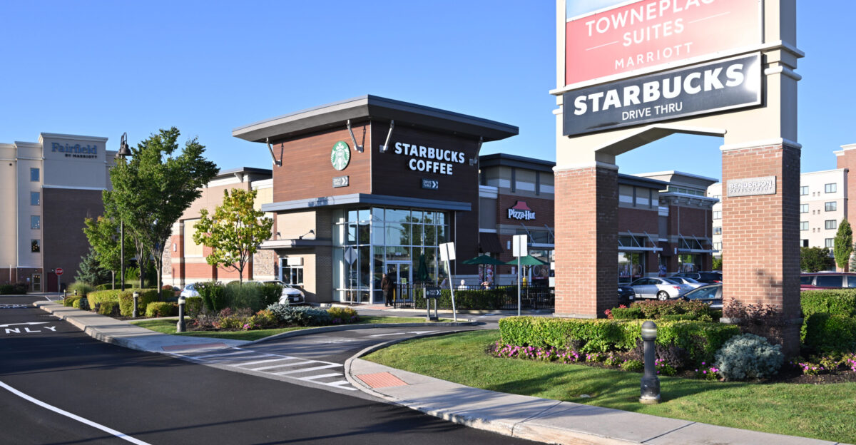 A Starbucks Coffee with drive-thru in the corner of a strip mall with a Fairfield by Marriott behind it 4255 Genesee Street Cheektowaga New York 14225